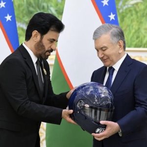 FIA President Ben Sulayem presents the President of the Republic of Uzbekistan, HE Shavkat Mirziyoyev, with a commemorative FIA race helmet